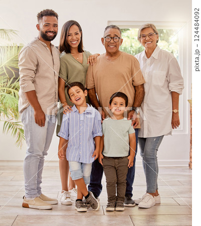 Happy family portrait with kids, parents and grandparents with smile standing in brazil home. Happiness, family and generations of men, women and children spending time together making fun memories. 124484092