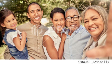 Selfie, portrait and big family with smile in park for love, care and adventure together during summer in Australia. Happy, child and parents for photo with senior grandparents in a nature garden 124484115