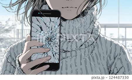 画面が激しく割れているスマートフォンを手にしているいる若い女性