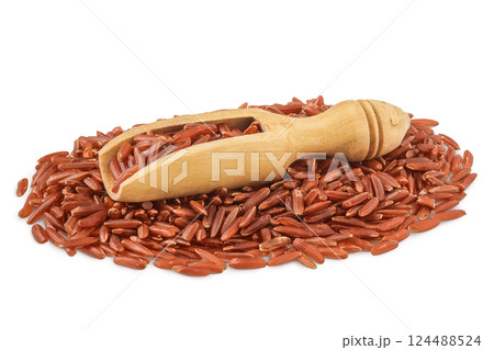 red rice in a wooden scoop isolated on white background red rice in a wooden scoop isolated on white background 124488524