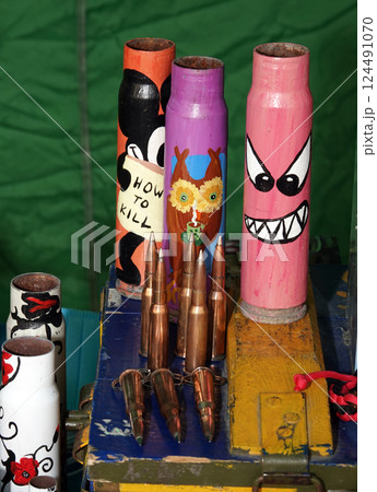 Kiev, Ukraine August 29, 2020: Sale on the street of Kiev city crafts from spent cartridges Kiev, Ukraine August 29, 2020: Sale on the street of Kiev city crafts from spent cartridges 124491070