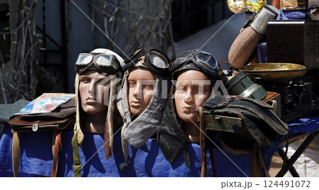 Kiev, Ukraine July 23, 2021: Sale of old military accessories on the street of the city of Kiev Kiev, Ukraine July 23, 2021: Sale of old military accessories on the street of the city of Kiev 124491072