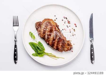 A perfectly cooked striploin steak with a juicy, tender texture A perfectly cooked striploin steak with a juicy, tender texture 124491189