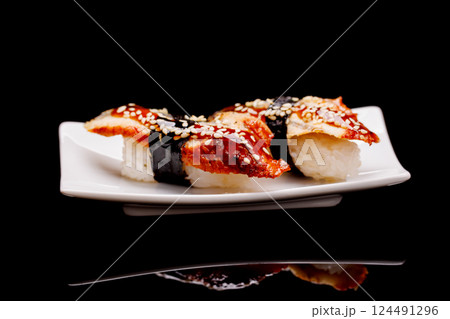 Unagi sushi beautifully arranged on plate 124491296