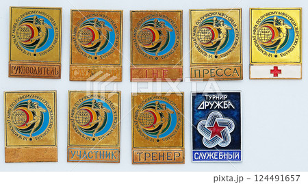 Kiev, Ukraine August 16, 2021: Lapel badges of the participants of the World Handball Championship of the USSR era 124491657