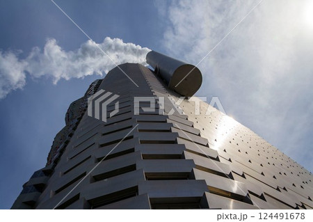 Public space with climbing wall on the roof of Amager Bakke known as Amager Slope or Copenhill, combined heat and power waste to energy plant with recreational facility, dry ski run a hiking trail, Public space with climbing wall on the roof of Amager Bakke known as Amager Slope or Copenhill, combined heat and power waste to energy plant with recreational facility, dry ski run a hiking trail, 124491678