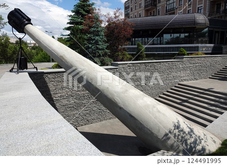 Monument Cinema spotlight with a downward beam of light Monument Cinema spotlight with a downward beam of light 124491995
