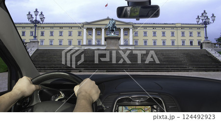 Driving a car towards the Royal Palace in Oslo, Norway Driving a car towards the Royal Palace in Oslo, Norway 124492923