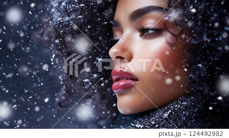 Cropped portrait of a beautiful black young woman with dark curly hair in snowstorm. Female face in profile with beautiful makeup. Cold winter weather This is AI-generated item 124492982