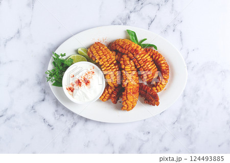 corn ribs, with cream sauce , spices and lime, appetizer, homemade, no people, corn ribs, with cream sauce , spices and lime, appetizer, homemade, no people, 124493885
