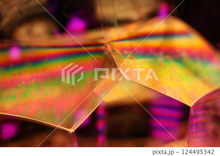 Green liquid surface on the dark background, colourful abstract, green edges 124495342