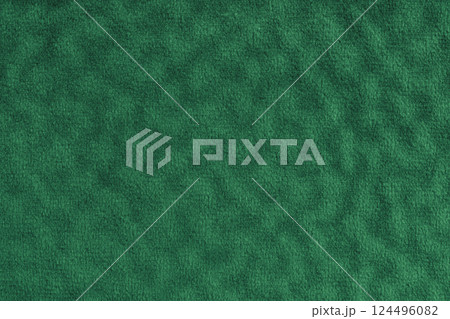 Faux fur , fluffy velours green fabric, cloth macro texture with wavy effect, upholstery textile Faux fur , fluffy velours green fabric, cloth macro texture with wavy effect, upholstery textile 124496082