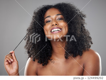Beauty, hair and black woman in a studio with mockup for wellness, skincare and health while grooming against grey background. Portrait, model and cosmetic, hair care and clear skin, relax aesthetic 124499202