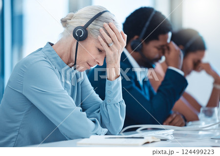 Telemarketing team, customer service employees and stressed crm workers at office desk. Senior business woman burnout, call center compliance consultant agent and stress headache on call with headset Telemarketing team, customer service employees and stressed crm workers at office desk. Senior business woman burnout, call center compliance consultant agent and stress headache on call with headset 124499223