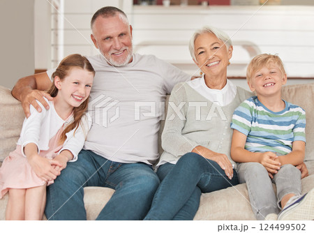 Grandparents, grandkids and being happy to relax and smile together on sofa in living room. Portrait, grandfather and grandmother with grandchildren for love, bonding and happiness on couch as family Grandparents, grandkids and being happy to relax and smile together on sofa in living room. Portrait, grandfather and grandmother with grandchildren for love, bonding and happiness on couch as family 124499502