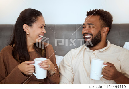 Couple, coffee and laughing people feeling happiness in a home living room lounge sofa. Happy, funny and smile in the morning of a girlfriend and boyfriend together on a house couch with quality time Couple, coffee and laughing people feeling happiness in a home living room lounge sofa. Happy, funny and smile in the morning of a girlfriend and boyfriend together on a house couch with quality time 124499510