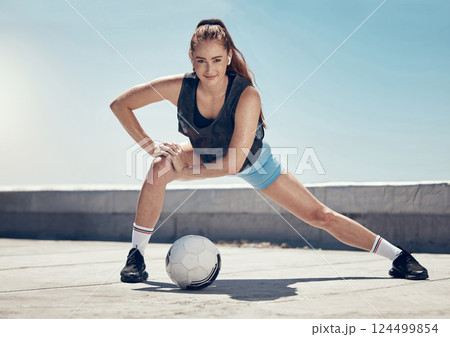 Woman, soccer and fitness stretching workout in city for football training or healthy athlete. Portrait of athletic girl, sports exercise wellness motivation and strong cardio stretch before game 124499854