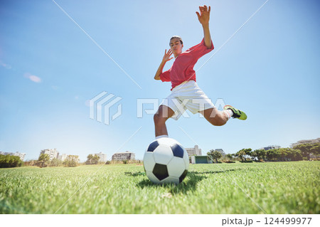 Soccer ball kick, sport and man athlete ready for team exercise, fitness and exercise game training. Football workout of a soccer player playing sport on an field in nature for cardio and wellness Soccer ball kick, sport and man athlete ready for team exercise, fitness and exercise game training. Football workout of a soccer player playing sport on an field in nature for cardio and wellness 124499977