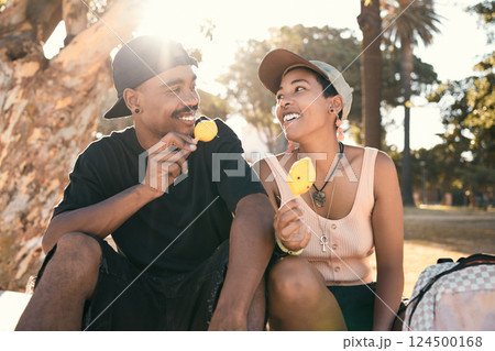 Happy, ice cream and couple in nature talking while on an adventure, holiday and journey in Mexico. Happiness, smile and young man and woman eating a dessert while on an outdoor date on vacation. Happy, ice cream and couple in nature talking while on an adventure, holiday and journey in Mexico. Happiness, smile and young man and woman eating a dessert while on an outdoor date on vacation. 124500168
