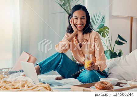 Breakfast, bedroom and woman on laptop, notebook and juice for food writer blog, copywriting or social media post planning. Relax morning and protein portrait of entrepreneur or work from home girl Breakfast, bedroom and woman on laptop, notebook and juice for food writer blog, copywriting or social media post planning. Relax morning and protein portrait of entrepreneur or work from home girl 124500244
