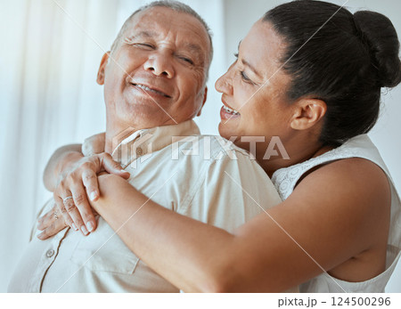 Retirement couple, love and hug in home for romance, relax and smile in Colombia living room together. Happy elderly man, senior woman or pension people marriage, happiness and care of easy lifestyle 124500296
