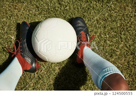 Soccer ball, grass field and shoes, soccer player and sport, athlete feet and fitness, sports game and training closeup. Soccer, ball and exercise, soccer field and outdoor, green and competitive. Soccer ball, grass field and shoes, soccer player and sport, athlete feet and fitness, sports game and training closeup. Soccer, ball and exercise, soccer field and outdoor, green and competitive. 124500555