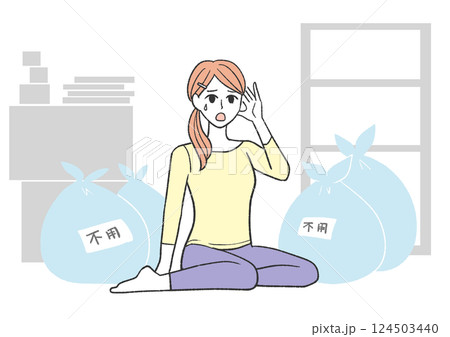 ゴミに囲まれて途方に暮れる女性 ゴミに囲まれて途方に暮れる女性 124503440