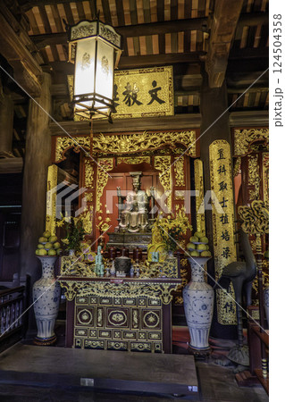 Vietnam, Hanoi, Statue of the Temple of Literature of Hanoi. 124504358