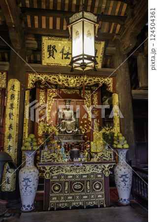 Vietnam, Hanoi, Statue of the Temple of Literature of Hanoi. 124504361