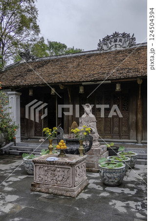 Vietnam, Hanoi, Offerings on the altar of the Mot Cot Pagoda or One Pillar Pagoda is a pagoda. Vietnam, Hanoi, Offerings on the altar of the Mot Cot Pagoda or One Pillar Pagoda is a pagoda. 124504394