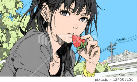イチゴを摘んで食べている若い女性