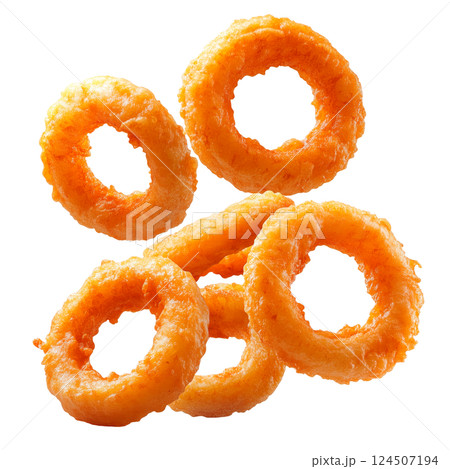 Crispy onion rings flying on a transparent background. Deep-fried snack rings, golden crunchy texture, flying fast food snack, isolated fried onions. 124507194