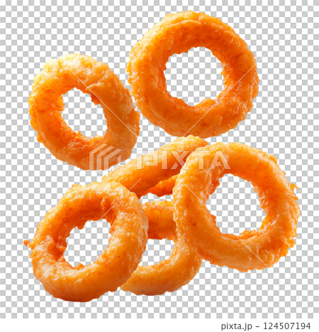 Crispy onion rings flying on a transparent background. Deep-fried snack rings, golden crunchy texture, flying fast food snack, isolated fried onions. 124507194