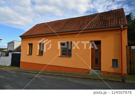 Traditional family house in a village or suburb in the Czech Republic - Europe. 124507978