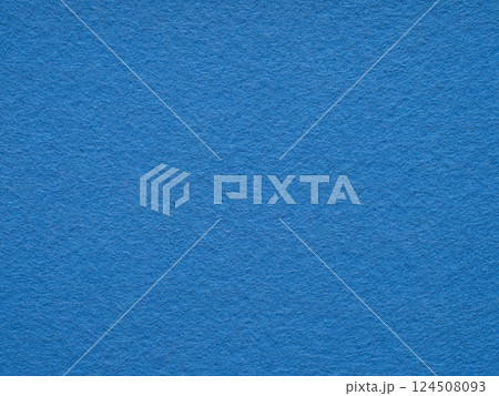 Vibrant sapphire felt surface, echoing with the depth of the ocean and the stillness of the sky 124508093