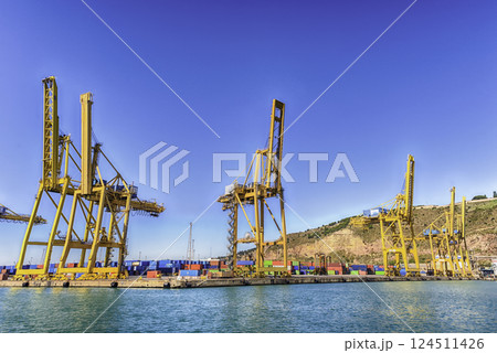 Container cranes at the commercial port of Barcelona, Catalonia, Spain 124511426