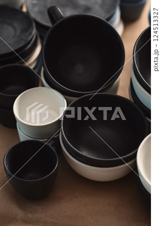 Matt ceramic handmade tableware in a workshop closeup Matt ceramic handmade tableware in a workshop closeup 124513327