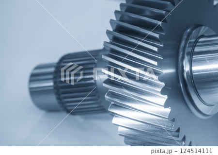 Close up the transmission  gear spare parts in the light blue scene. 124514111