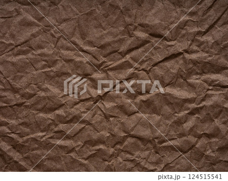 Shades of cocoa and coffee blend in the crumpled texture, evoking warmth and the comfort of simplicity 124515541