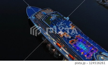 Illuminated cruise ship in sea at night Illuminated cruise ship in sea at night 124516261