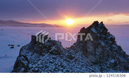 Shaman rock in frozen lake Baikal 124516306