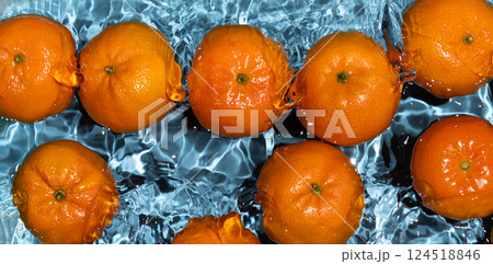 Long fruit banner, tangerines in water, splash of water, top view Long fruit banner, tangerines in water, splash of water, top view 124518846