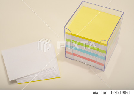 A paper block in the office. A block of paper for notes. 124519861