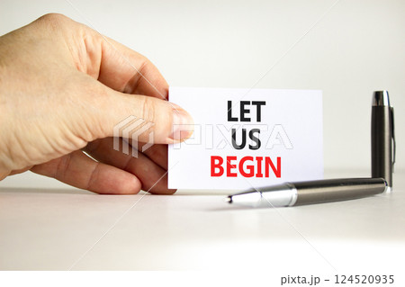 Let us begin symbol. Concept words Let us begin on beautiful white card. Beautiful white background. Businessman hand. Business motivational let us begin concept. Copy space. Let us begin symbol. Concept words Let us begin on beautiful white card. Beautiful white background. Businessman hand. Business motivational let us begin concept. Copy space. 124520935