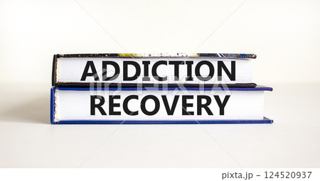 Addiction recovery symbol. Concept words Addiction recovery on beautiful books. Beautiful white table white background. Psychology addiction recovery concept. Copy space. 124520937
