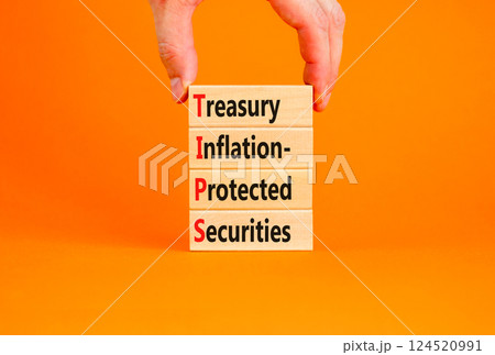 TIPS symbol. Concept word TIPS Treasury Inflation Protected Securities on beautiful blocks. Beautiful orange background. Business TIPS Treasury Inflation Protected Securities concept. Copy space. TIPS symbol. Concept word TIPS Treasury Inflation Protected Securities on beautiful blocks. Beautiful orange background. Business TIPS Treasury Inflation Protected Securities concept. Copy space. 124520991