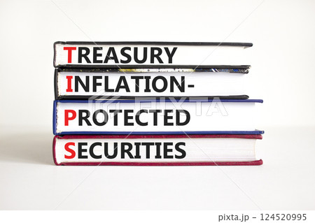 TIPS symbol. Concept word TIPS Treasury Inflation Protected Securities on beautiful books. Beautiful white background. Business TIPS Treasury Inflation Protected Securities concept. Copy space. TIPS symbol. Concept word TIPS Treasury Inflation Protected Securities on beautiful books. Beautiful white background. Business TIPS Treasury Inflation Protected Securities concept. Copy space. 124520995