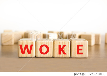 Woke question symbol. Concept word Woke question on beautiful wooden blocks. Beautiful wooden table white background. Business, lifestyle, support and woke question concept. Copy space. Woke question symbol. Concept word Woke question on beautiful wooden blocks. Beautiful wooden table white background. Business, lifestyle, support and woke question concept. Copy space. 124521019