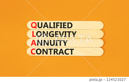 QLAC symbol. Concept word QLAC Qualified Longevity Annuity Contract on beautiful wooden sticks. Beautiful orange background. Business QLAC Qualified Longevity Annuity Contract concept. Copy space. 124521027