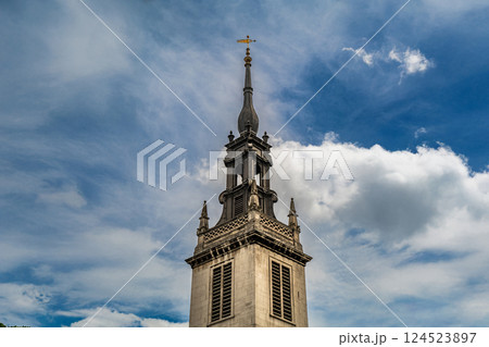 The Church of St. Augustine s towering spire, adorned with exquisite Baroque details, stands as a testament to classical European architecture. The Church of St. Augustine s towering spire, adorned with exquisite Baroque details, stands as a testament to classical European architecture. 124523897
